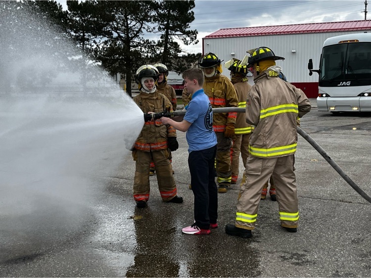 Mastering the use of a fire hose!
