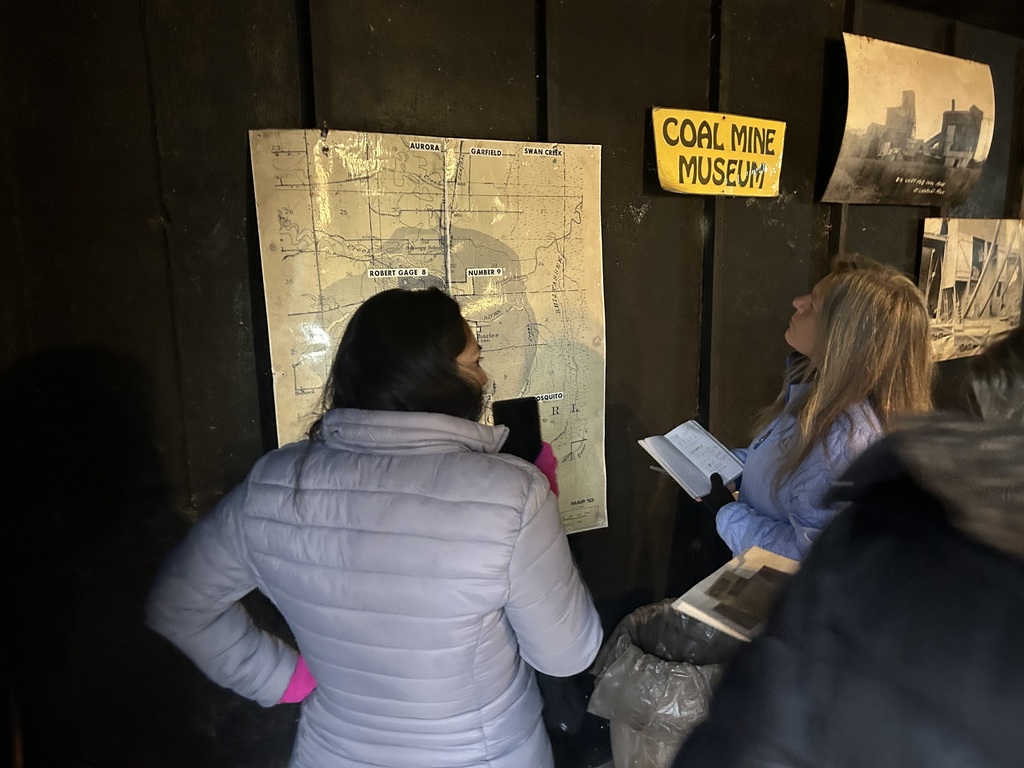Two women looking at a map