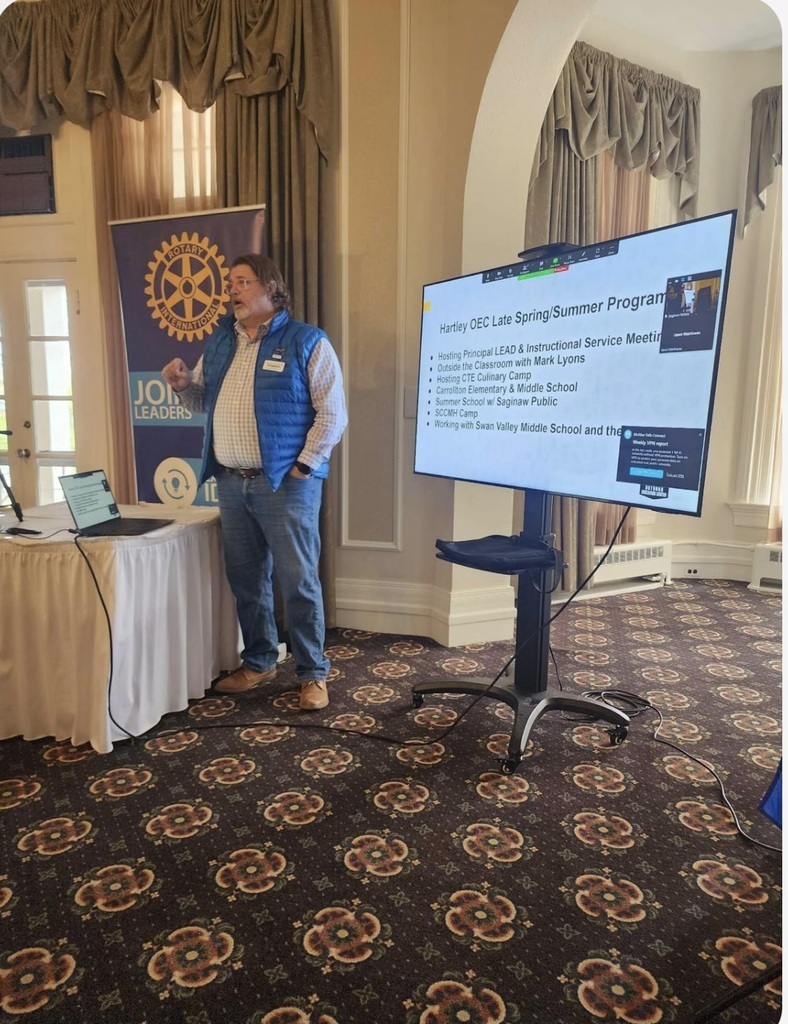 Person presenting at Rotary meeting