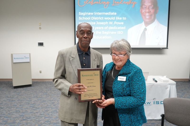 Joe Powe and President Ruth Ann Coppens pose for photo